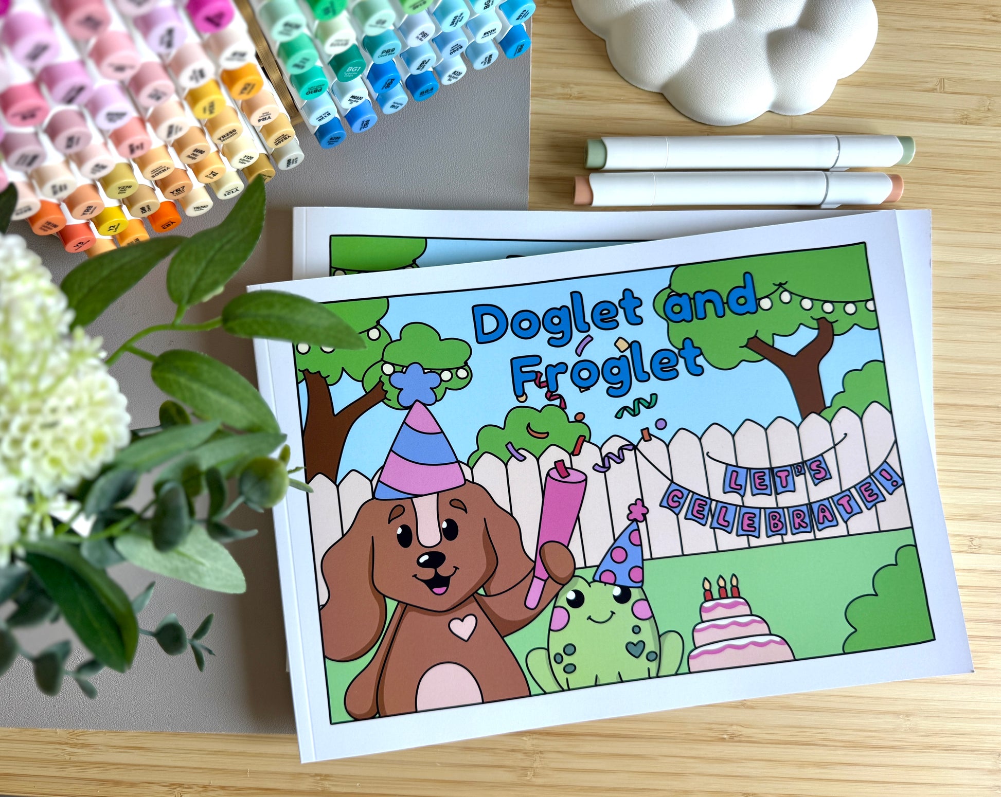 Premium A4 cardstock colouring book for adults and children in the UK featuring hand drawn Doglet and Froglet illustrations with thick bleed-resistant pages for alcohol markers
new doglet and froglet book