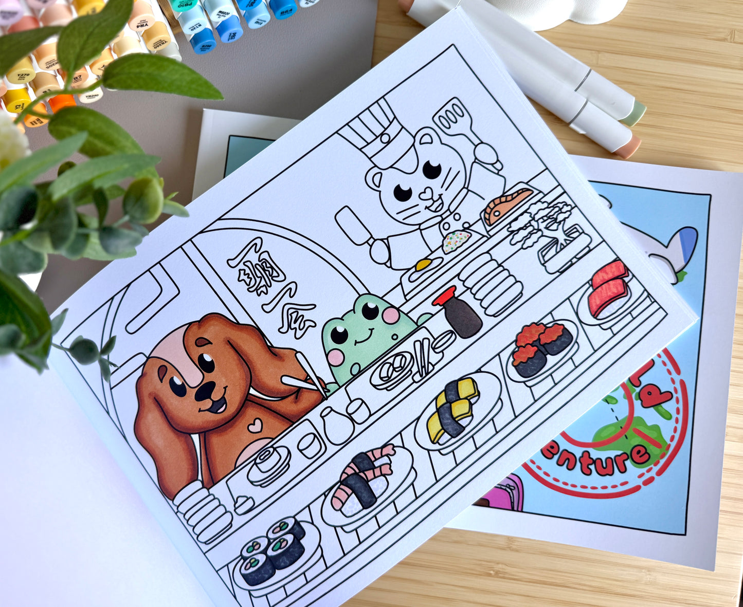 Premium A4 cardstock colouring book for adults and children in the UK featuring hand drawn Doglet and Froglet illustrations with thick bleed-resistant pages for alcohol markers
colouring book about travelling