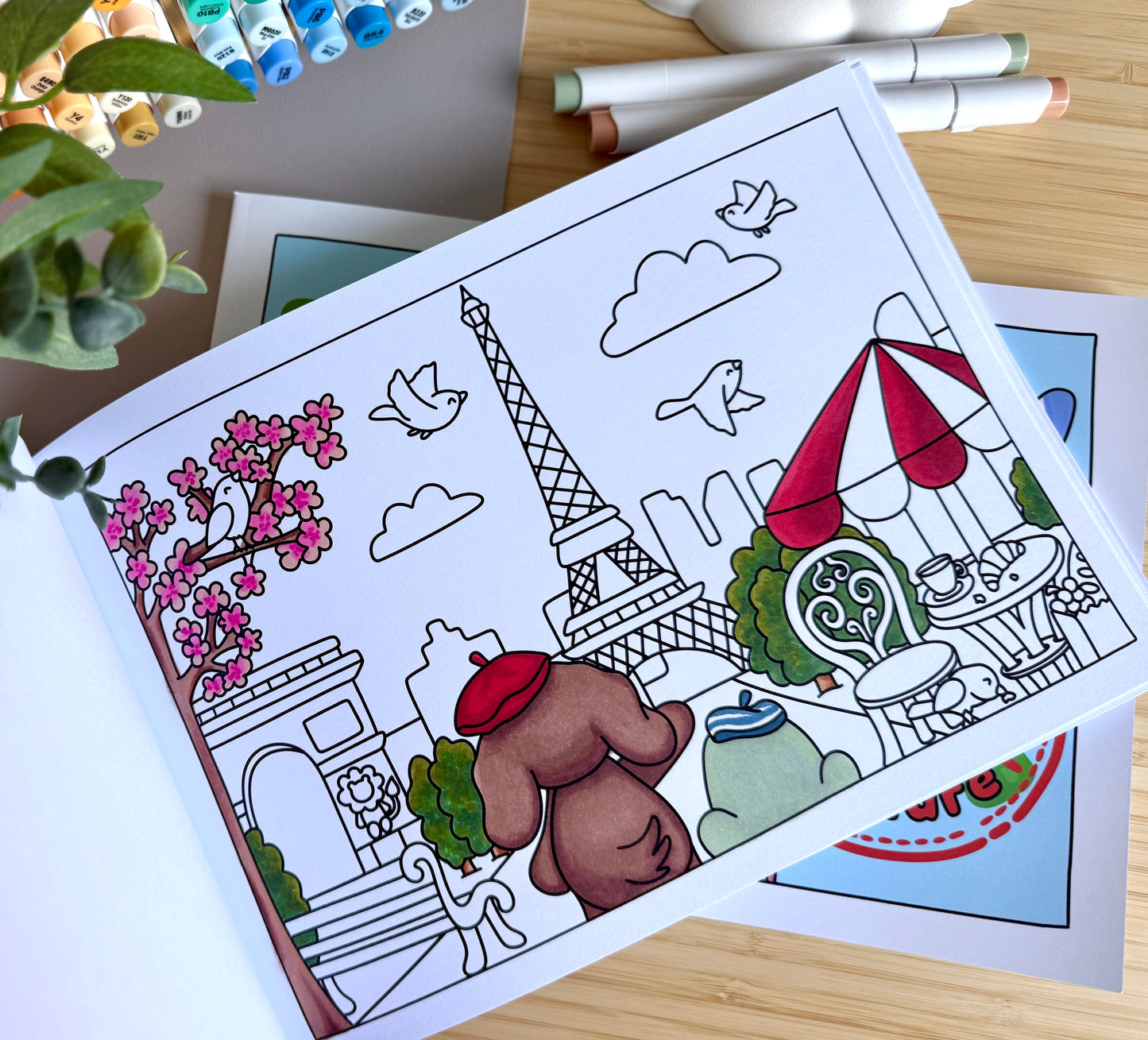 Premium A4 cardstock colouring book for adults and children in the UK featuring hand drawn Doglet and Froglet illustrations with thick bleed-resistant pages for alcohol markers
colouring book about travelling