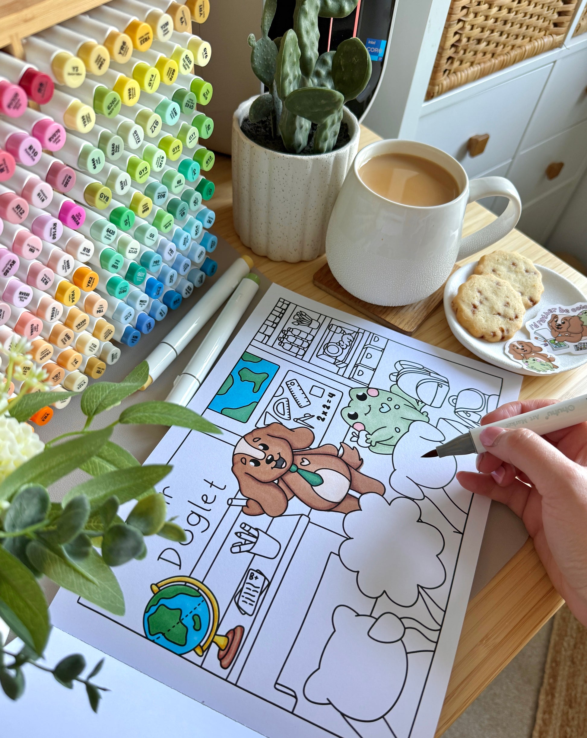 Premium A4 cardstock colouring book for adults and children in the UK featuring hand drawn Doglet and Froglet illustrations with thick bleed-resistant pages for alcohol markers
colouring gifts
